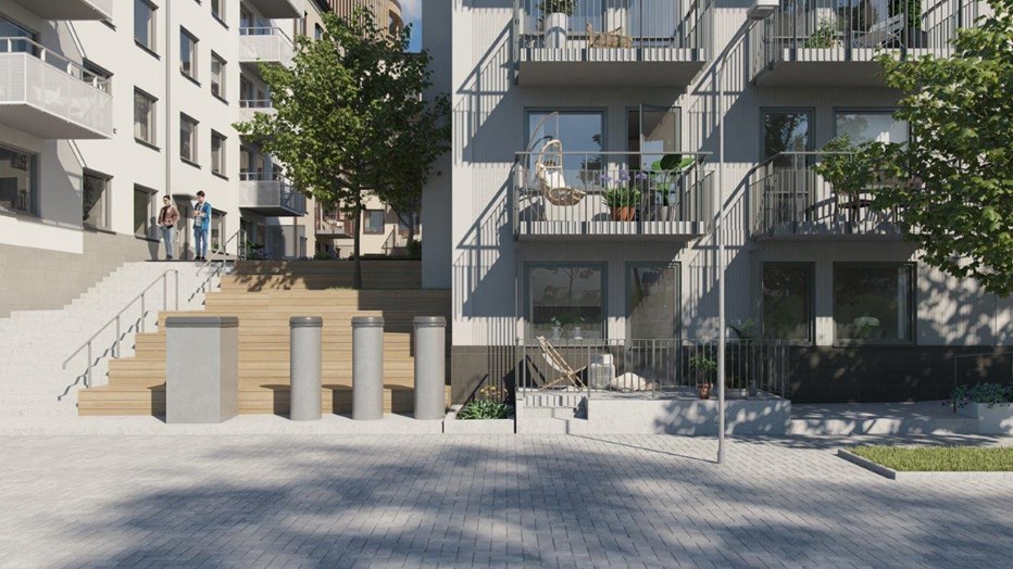 Sophanteringen i området hanteras med hjälp av sopsug. Brf Scilla är Svanenmärkt. Sopsugsanläggning sedd ovan jord mot bakgrunden av husfasader.