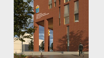 Byggnaden är välkomnande och varm med den stora entrétrappan.