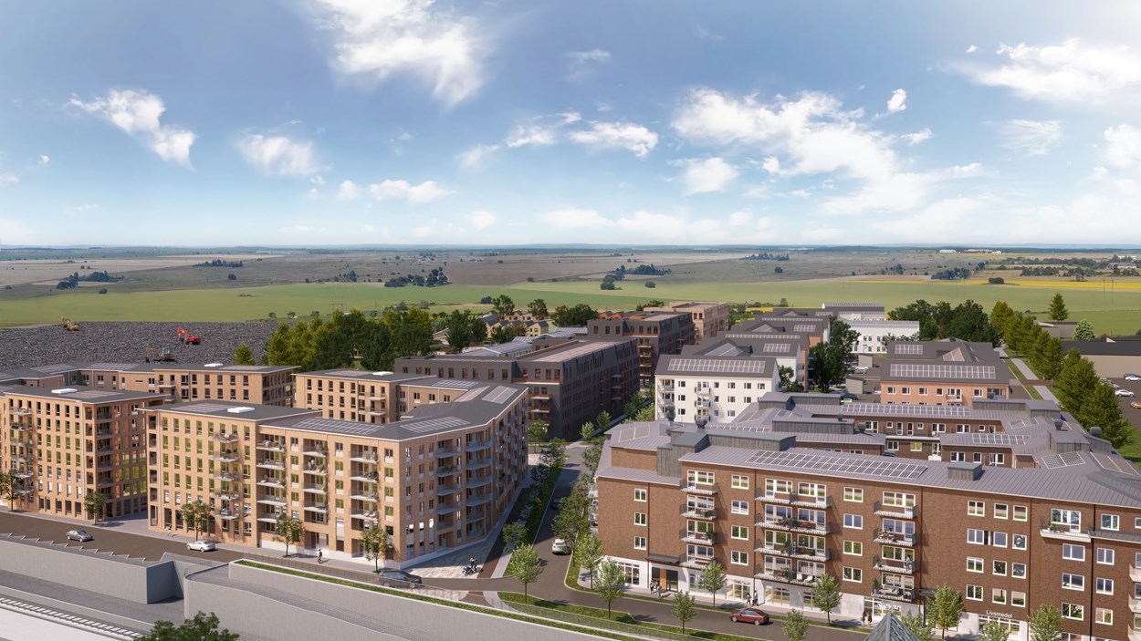 Olika typer av flerfamiljsbostäder och radhus på en visionsbild för Hjärup Västerstad. 