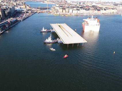 Towing the bridge to the quay.