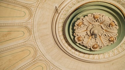 Ventilation, sprinkler and smoke detection are hidden in the beautiful stucco of the roof.