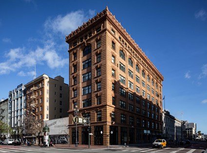 Synapse Development Group wanted to revitalize the Market Street neighborhood of San Francisco by investing in a hotel that met the needs of travelers visiting the area's major technology companies. Skanska partnered with the design team to transform a 1904 office building into a technology-focused hotel, while preserving the structure's historical significance.
