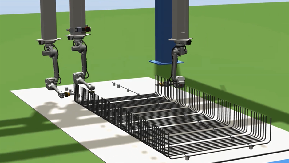 Robotarna plockar upp, placerar och najar ihop järn i armeringsarbetet. Robotdalen, Eskilstuna.