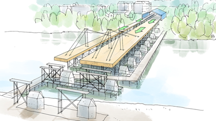 Karlgårdsbron monteras i sektioner i ett väderskydd på land innan de skjuts ut över älven.