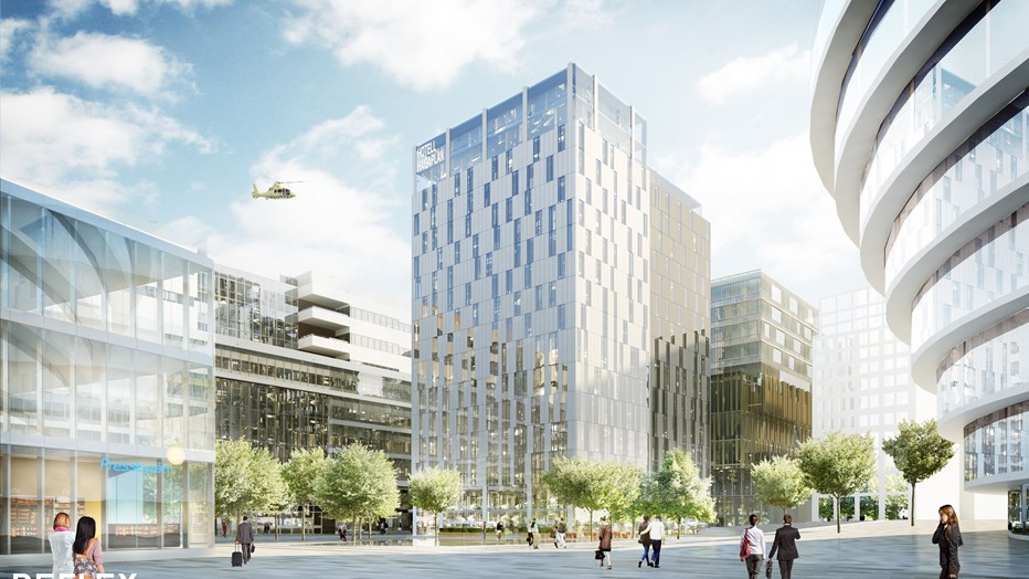 Den 17 våningar höga hotell- och kontorsbyggnaden kännetecknas av glaspartier som inte går i raka linjer. Den 17 våningar höga hotell- och kontorsbyggnaden kännetecknas av glaspartier som inte går i raka linjer.