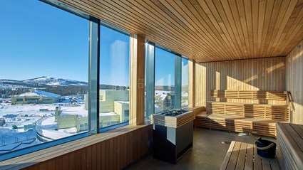 In the sauna, guests can enjoy the view of Kiruna and the surrounding nature. Photo Scandic