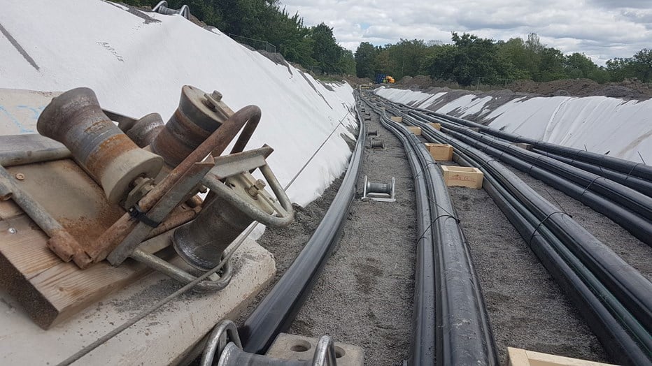 The cable measured 13 centimeters in diameter. The cables laid out, waiting to be covered.