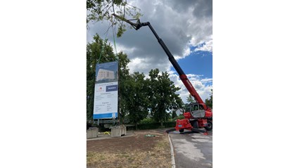 Informative signs about the construction work are posted around the workplace.