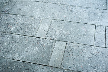 The floor tiles are speckled with crushed stone in different colors.
