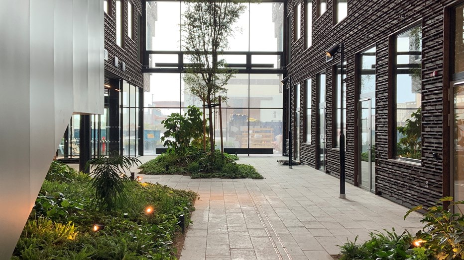 The green atrium invites you to socialize. The green atrium invites you to socialize.