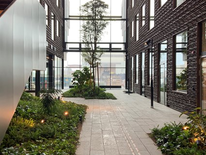 The green atrium invites you to socialize.